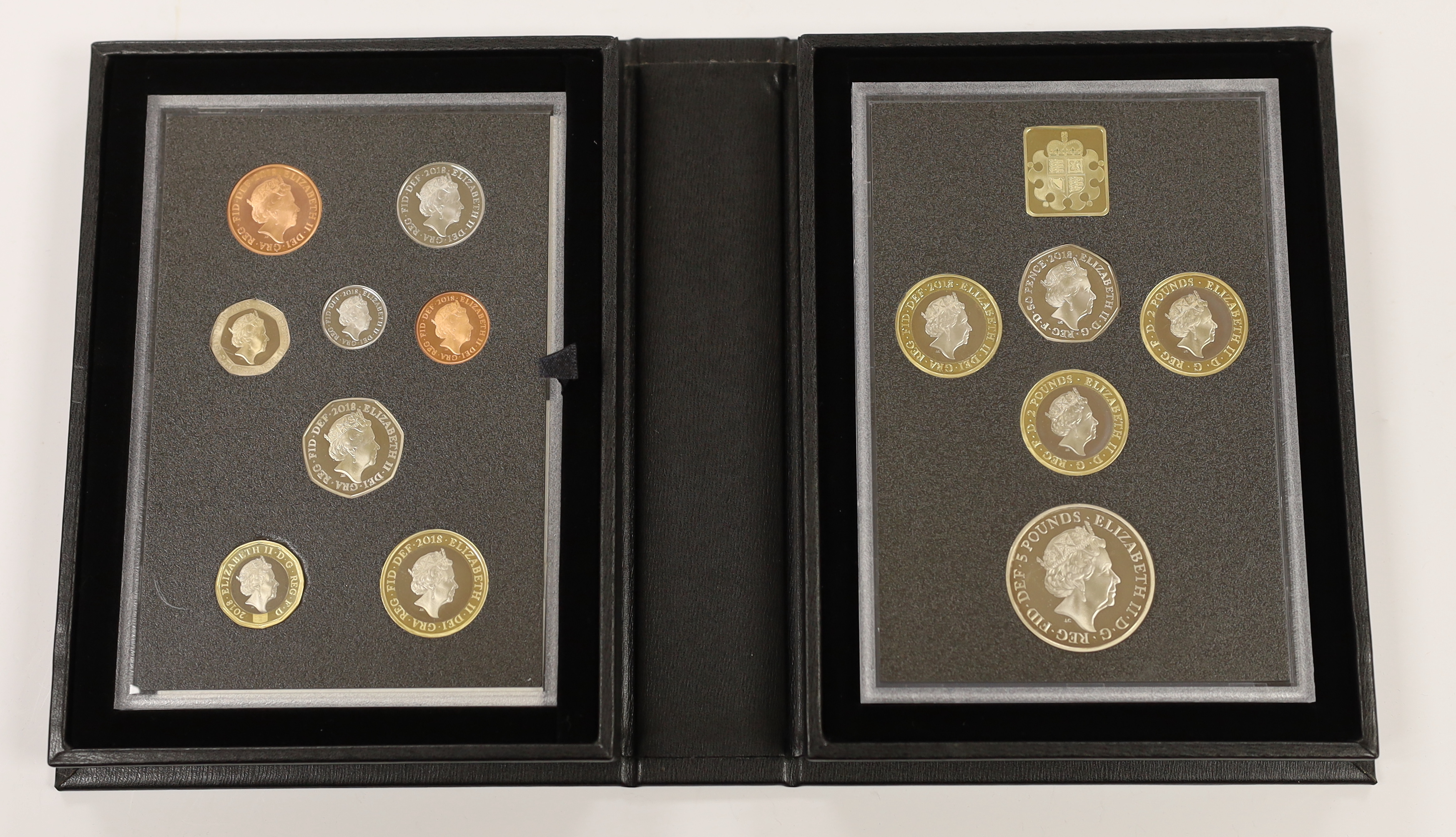 Two Royal Mint UK QEII Proof coin sets for 2018 and 2019, each containing definitive and commemorative coins, 2 cases